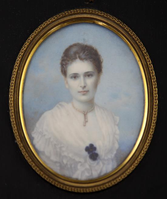 Attributed to Robert Hall (fl.1898-1909) Miniature of a lady wearing a white dress and black poppies, 3.25 x 2.5in.